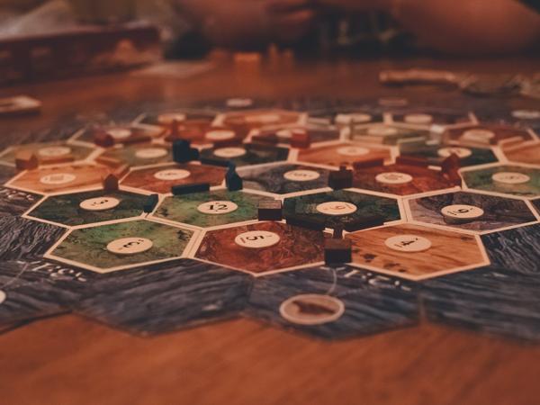 People playing a board game