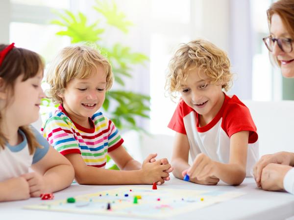 Family playing board game