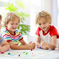 Family playing board game