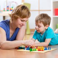 Mother and son playing Ludo