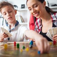 Family playing board game