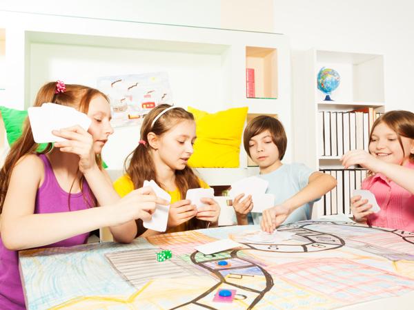 Kids playing a board game