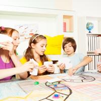 Kids playing a board game