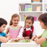 Kids playing board game