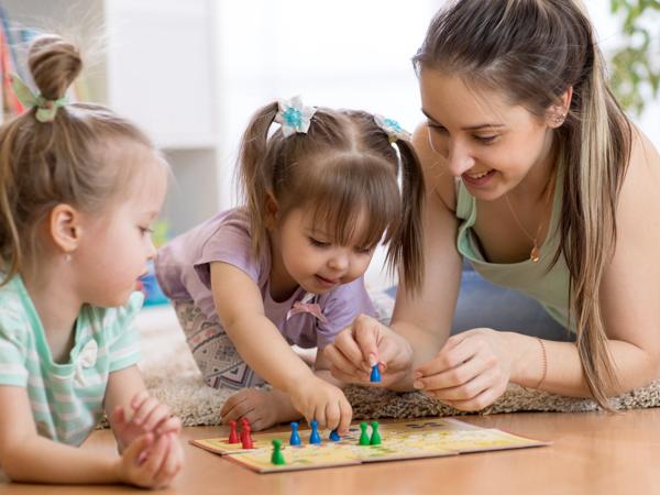 Family playing board game