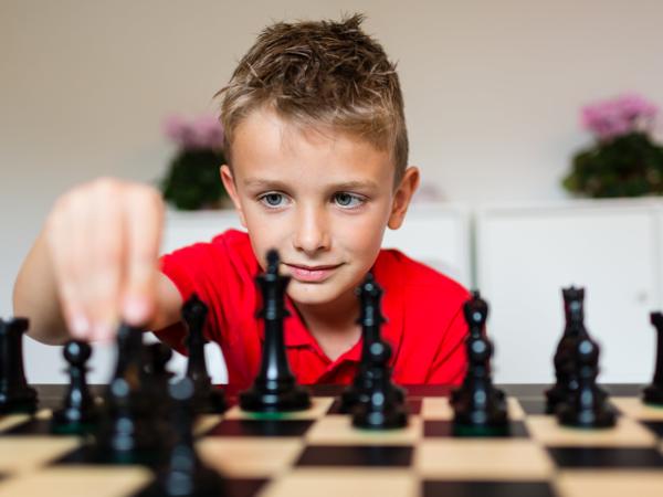 Child playing chess