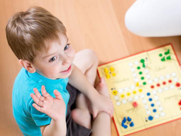 boy playing ludo