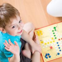 boy playing ludo