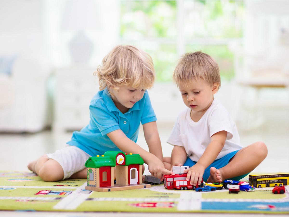 kids playing with toy cars