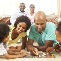 Family playing board game