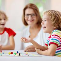 Family playing board game