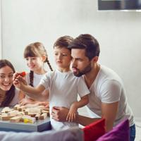 Happy family playing board games