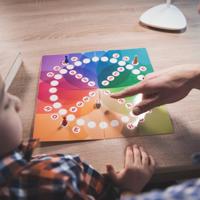 Father and son playing Ticket to Ride