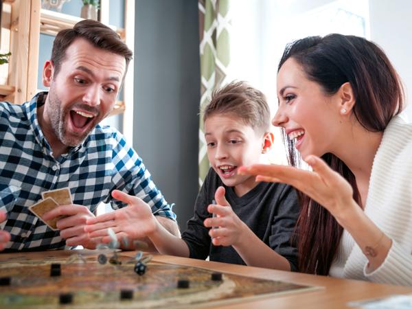 Family playing board games