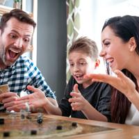 Family playing board games