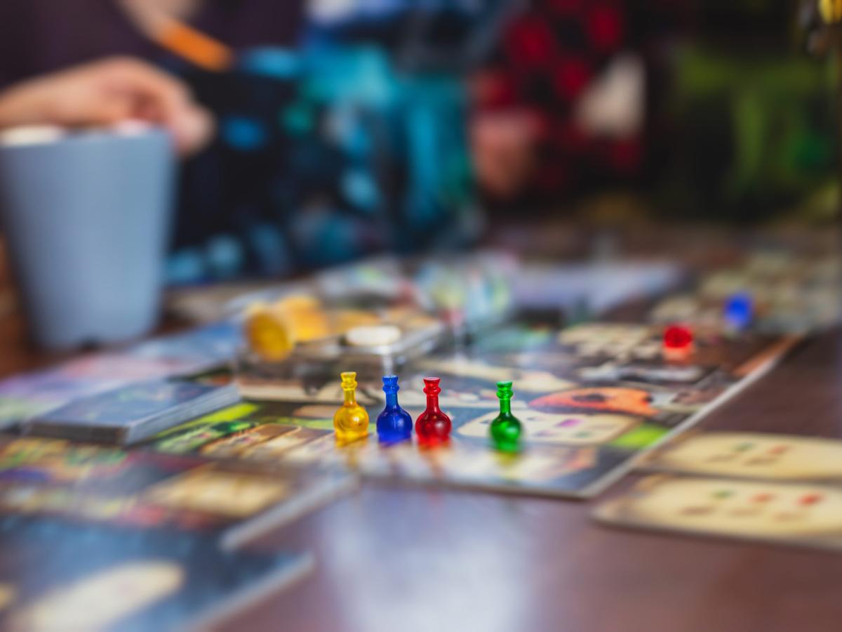 Friends playing board game