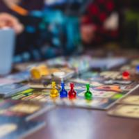 Friends playing board game