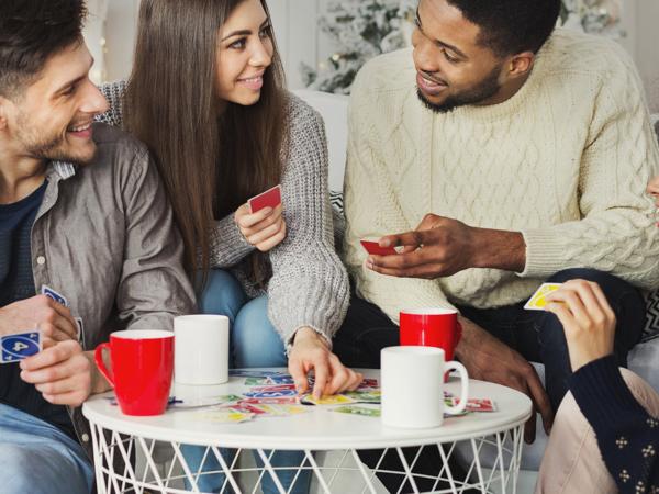 Friends playing UNO