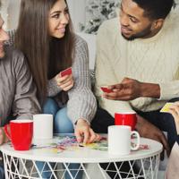 Friends playing UNO